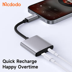 ADAPTADOR DE AUDIO MCDODO 2 EM 1 LIGHTNING PARA LIGHTNING + DC COM REPRODUÇÃO DE MUSICA 3,5 MM